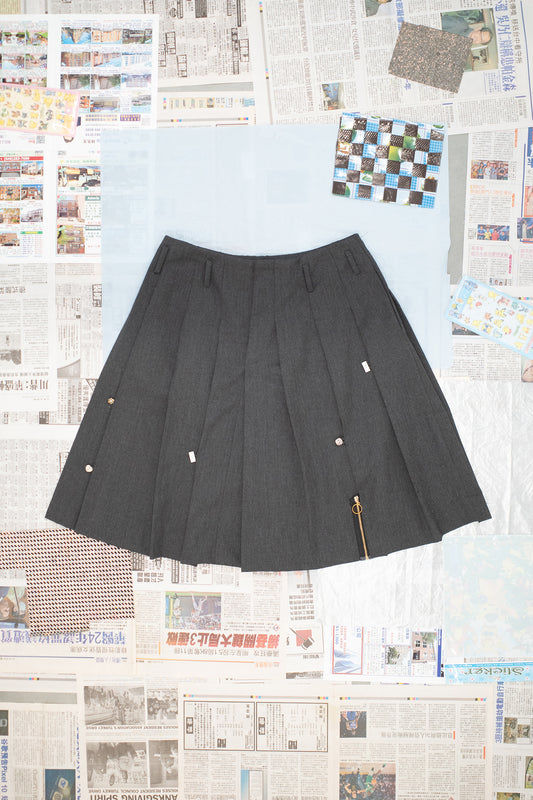 Pleated Skirt with Button and Zipper Detail